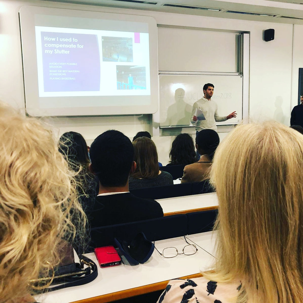 An audience watching a Stop Holding Back presentation